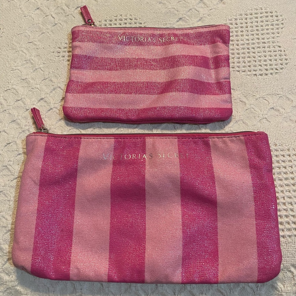 Two pink small travel bags